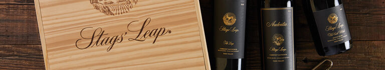 A bottle of Stags' Leap wine with a wooden gift box