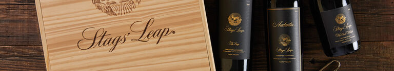 A bottle of Stags' Leap wine with a wooden gift box