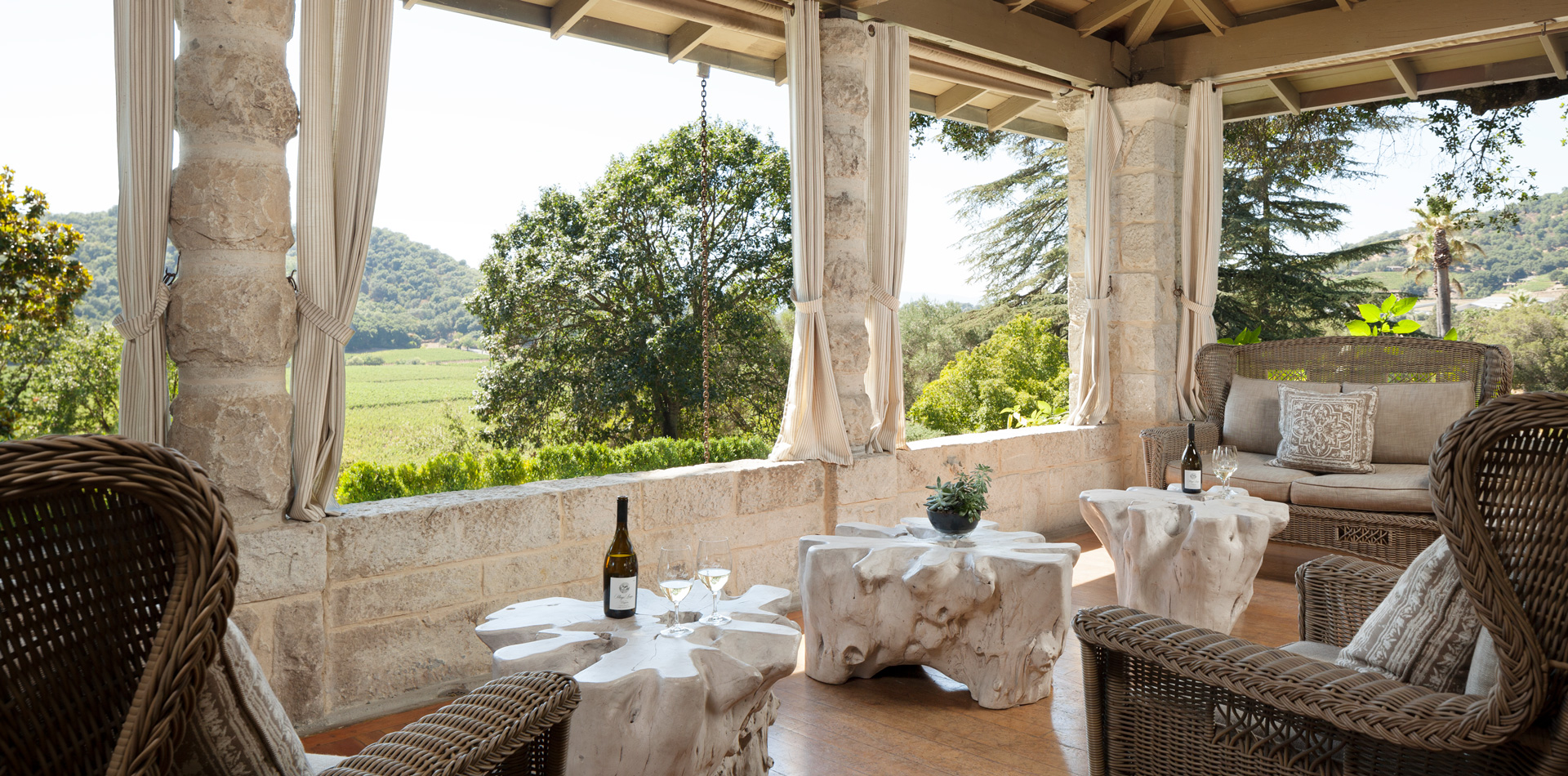 Looking out from the wrap-around porch at Stags' Leap Winery towards the vineyards.